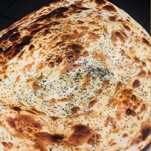 Traditionelles Hadrami-Brot, ofenwarm und mit Honig verfeinert - eine sulbe Variante des Klassikers.4c